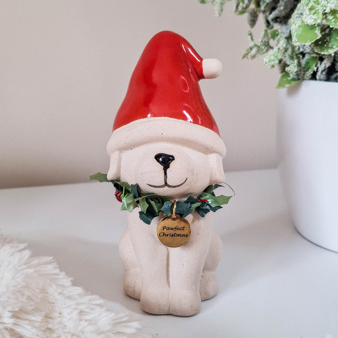 Dog in Red Christmas Hat