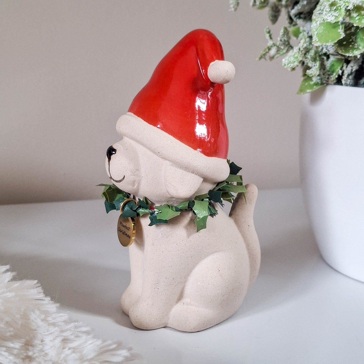 Dog in Red Christmas Hat
