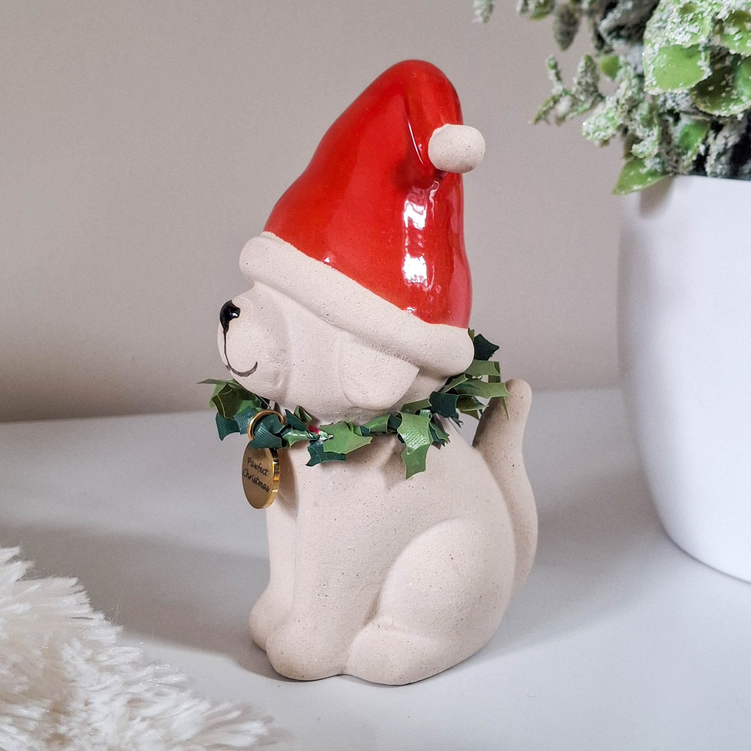 Dog in Red Christmas Hat