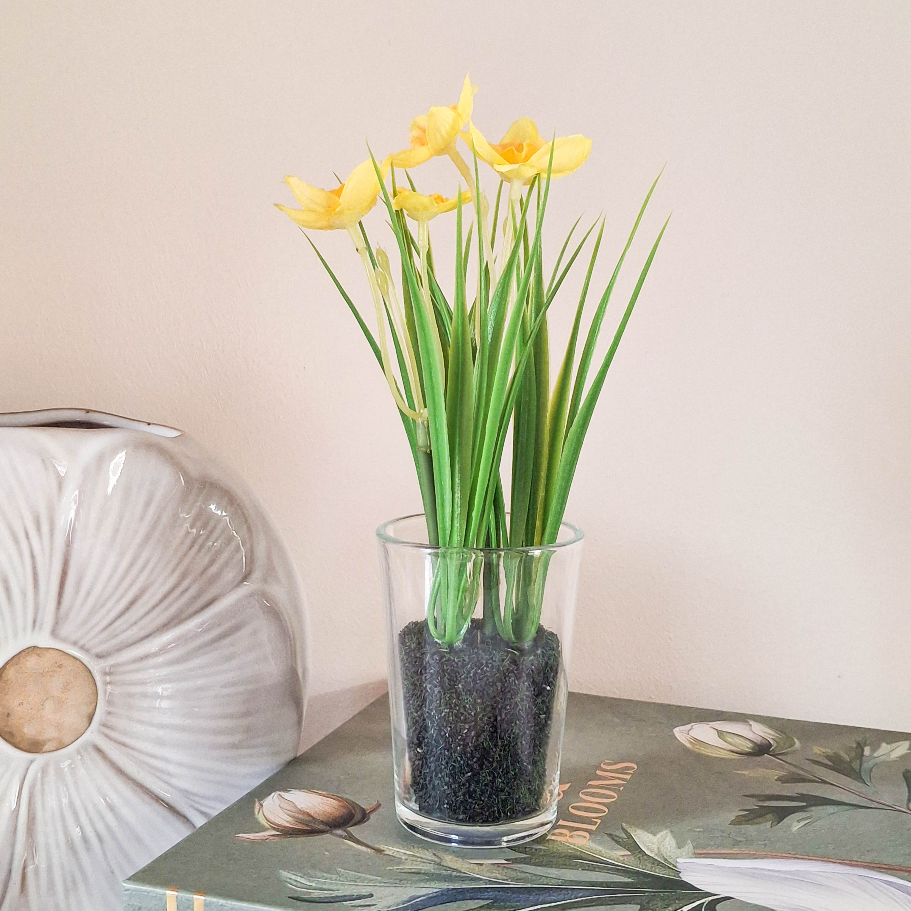 Artificial Daffodils in Glass Vase