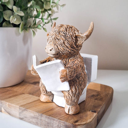 Reading on Loo Happy Highland Cow
