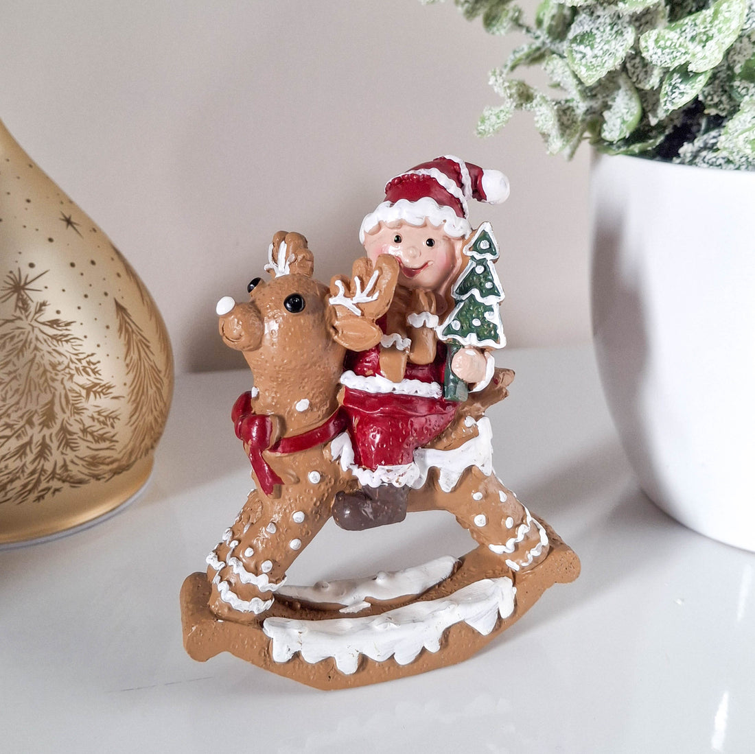 Small Gingerbread Snowman on Reindeer