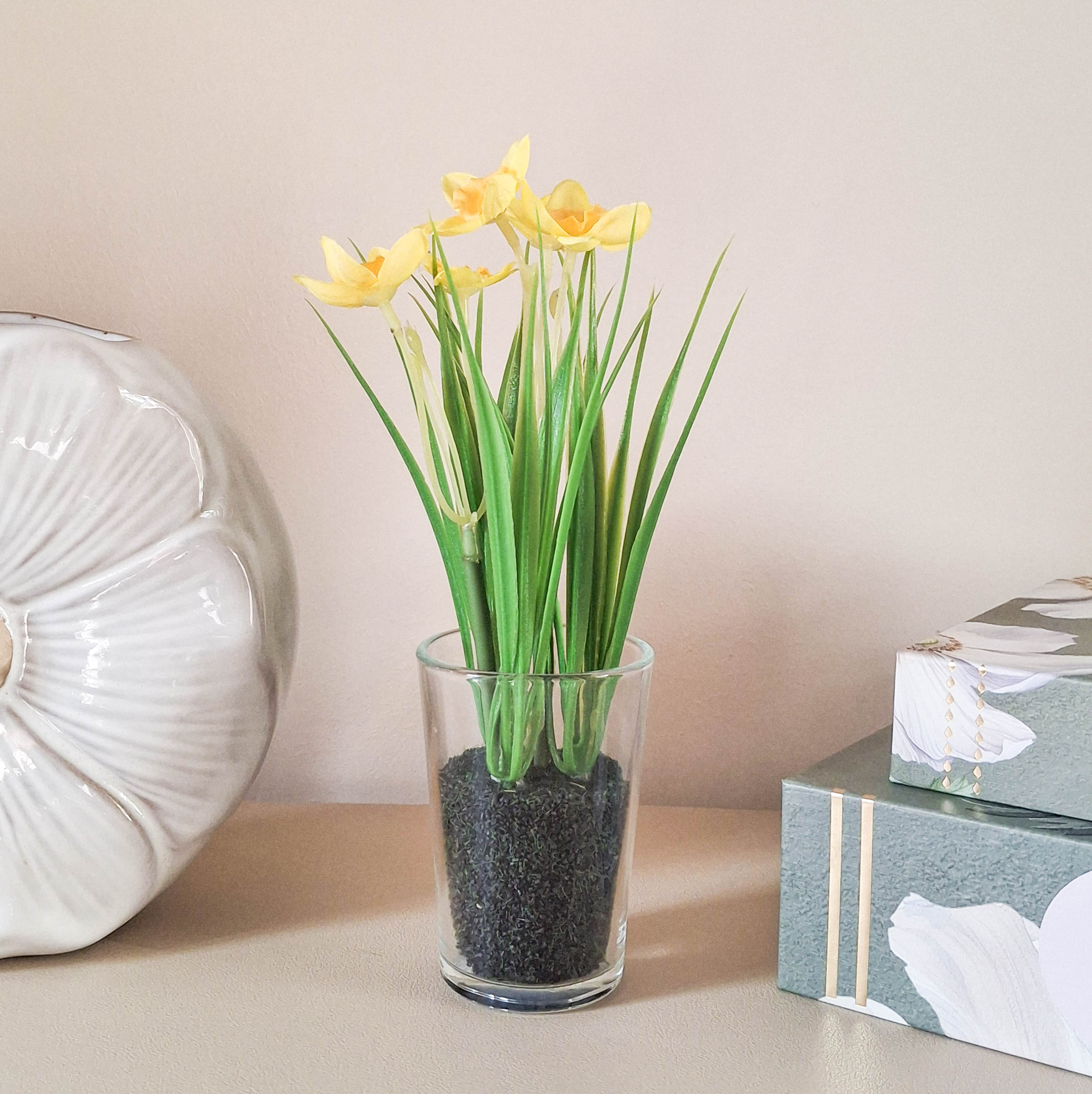 Artificial Daffodils in Glass Vase