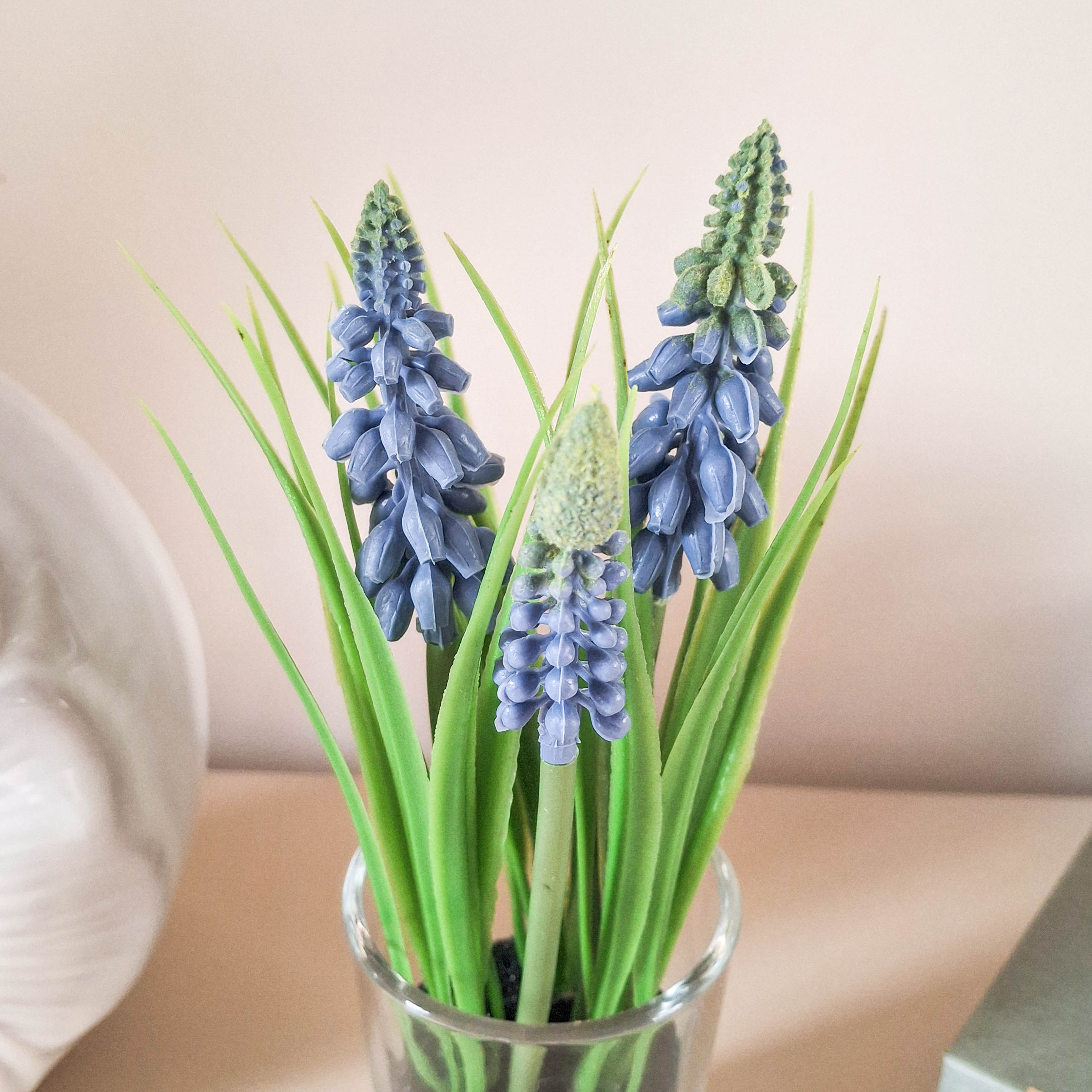 Artificial Hyacinthus in Glass Vase