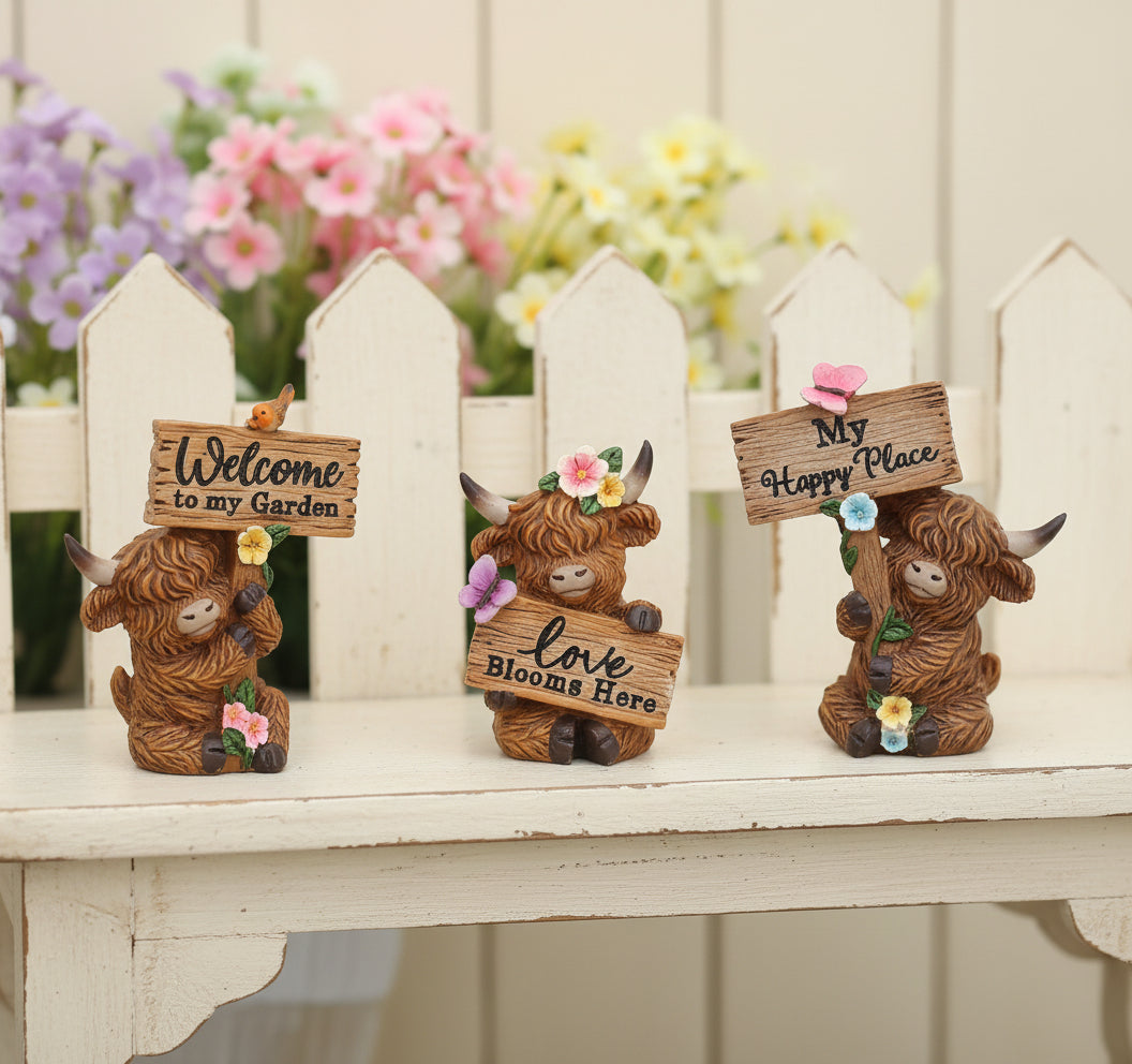 Small Highland Cow with Sign