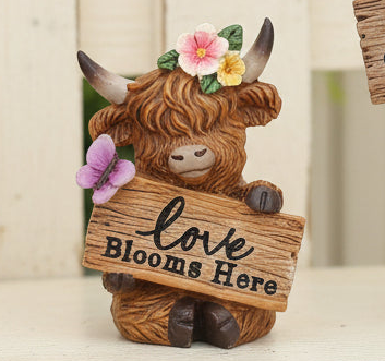 Small Highland Cow with Sign