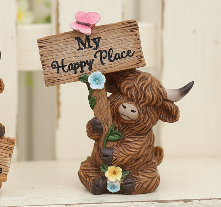 Small Highland Cow with Sign