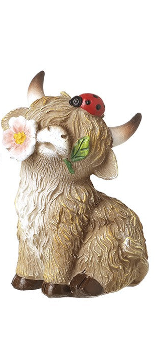 Sitting Highland Cow with Flower